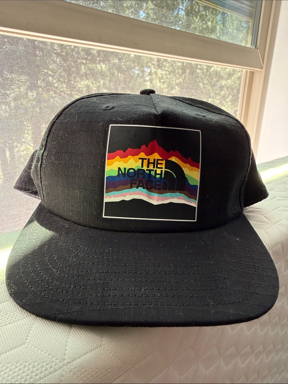 The North Face Black Cap with Rainbow Mountain Patch